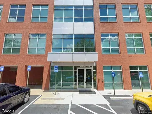 Modern brick building entrance of Vitality Drug's detox center in Atlanta.