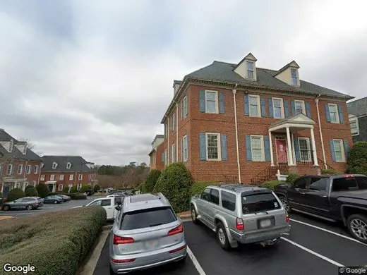 Brick exterior of Hope Homes, Inc, a sober living home in Atlanta, featuring a welcoming entrance and landscaped surroundings.